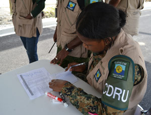CDRU Assistant Logistic Officer, Warrant Officer Class II Cheryl Phillips of the Jamaica Defence Force practices her role during the Field Training Exercise
