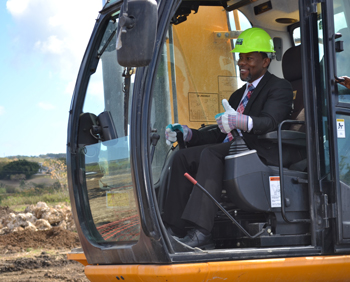 Ronald Jackson, Executive Director, gets ready to officially signal start of construction of CDEMA headquarters