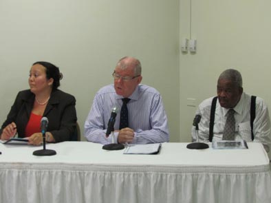 His Excellency Governor Boyd McCleary (center), Hon. Premier Ralph T. O’Neal (right) and Ms Sharleen DaBreo (left) at head table while presentations are being made
