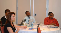 Participants listen attentively as the CCDM Project Evaluation Results are presented 