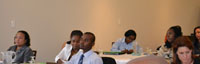 Participants listen attentively as the CCDM Project Evaluation Results are presented 